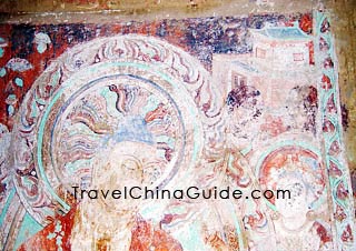 Colorful murals inside the cave